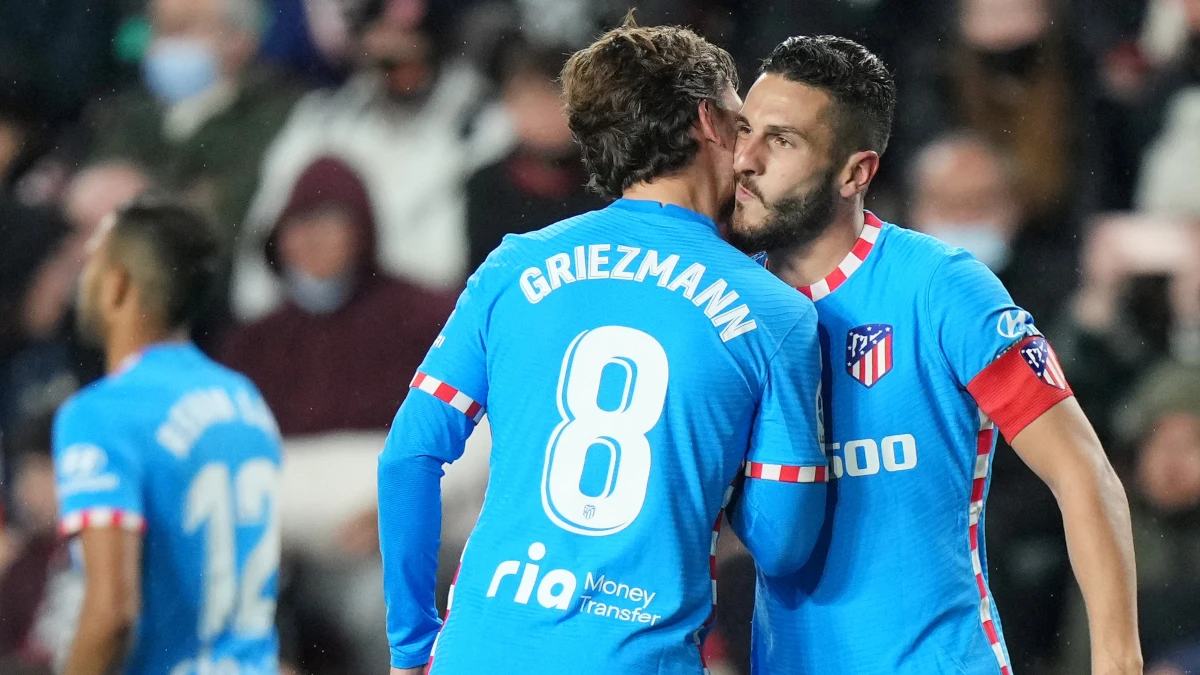 Celebración entre Griezmann y Koke