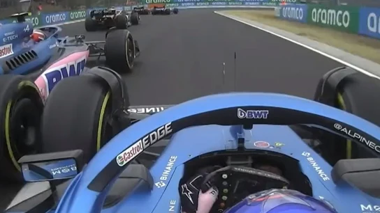 Fernando Alonso y Esteban Ocon en la salida del GP de Hungría Fernando Alonso y Esteban Ocon en la salida del GP de Hungría