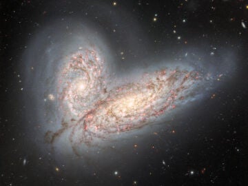 Fusión de las galaxias NGC 4567 y NGC 4568