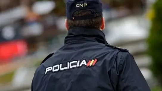 Imagen de archivo de un policía nacional Imagen de archivo de un policía nacional