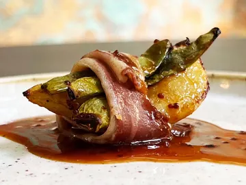 Tapa del restaurante Distrito Vegano Invernadero Tapa del restaurante Distrito Vegano Invernadero