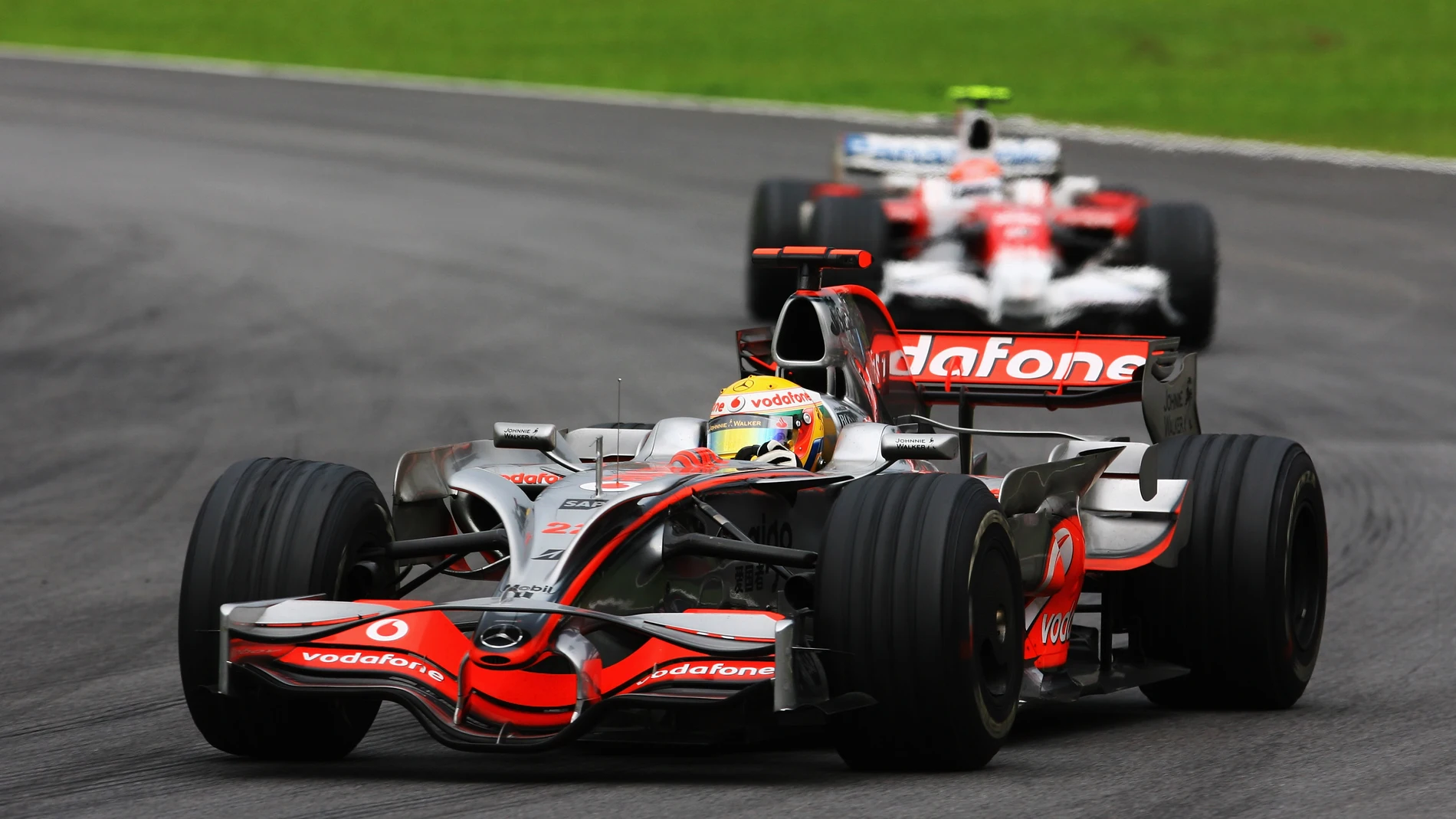 Lewis Hamilton y Timo Glock