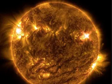 Imagen de la llmarada solar del 2 de octubre de 2022, apreciable en la esquina superior derecha.