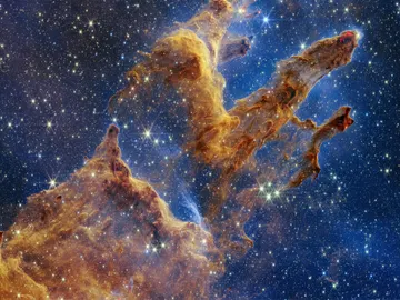 "Pilares de la Creación" en la Nebulosa del Águila "Pilares de la Creación" en la Nebulosa del Águila