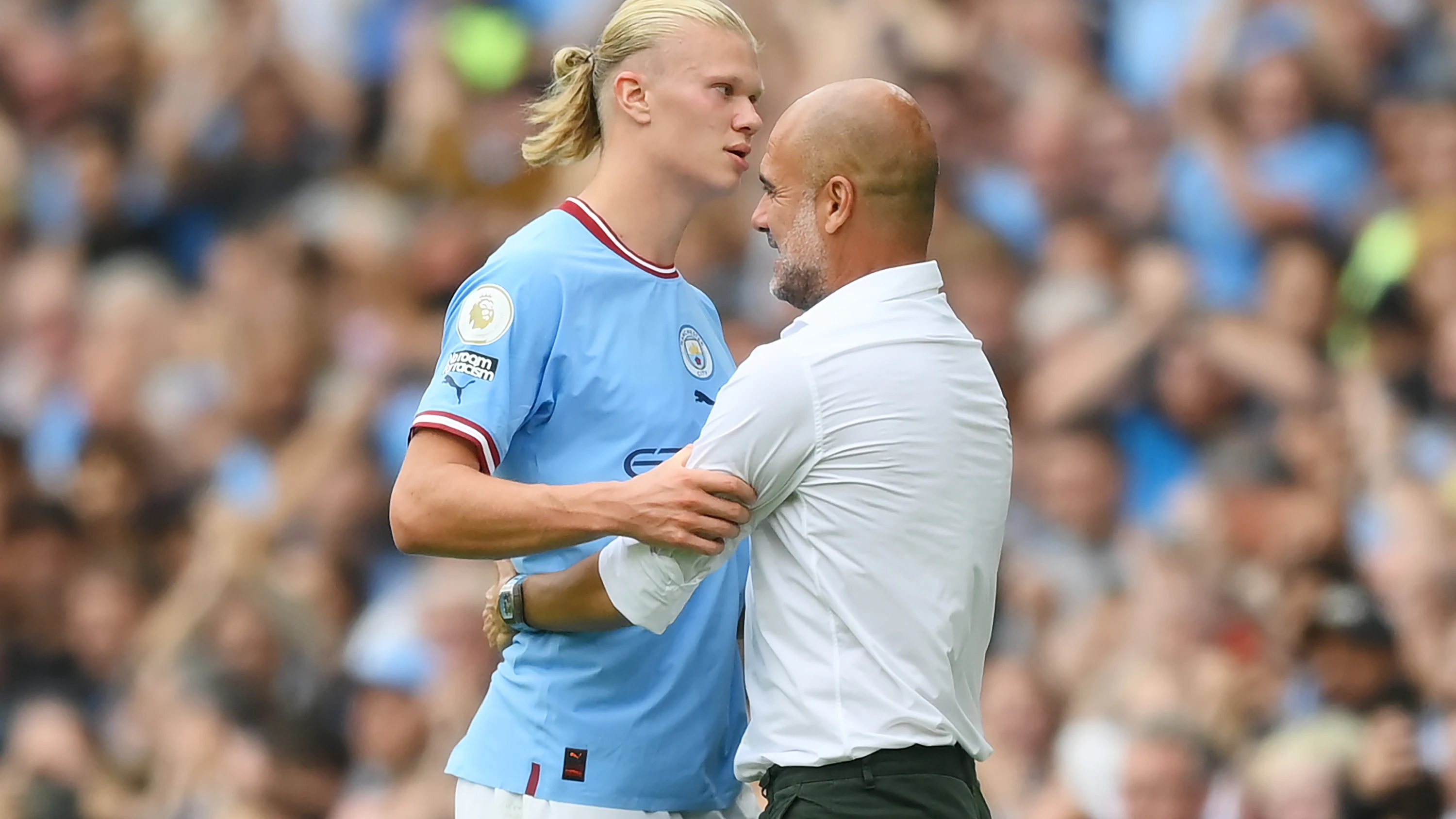 Erling Haaland y Pep Guardiola