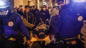 Un manifestante herido en enfrentamientos con la Policía en Perú