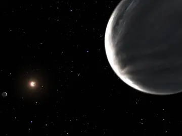Exoplaneta Kepler-138 d en primer plano y Kepler-138 c a la izquierda Exoplaneta Kepler-138 d en primer plano y Kepler-138 c a la izquierda