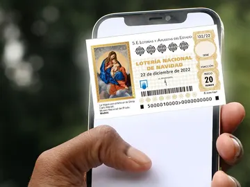 Un décimo de Lotería de Navidad y un iPhone Un décimo de Lotería de Navidad y un iPhone