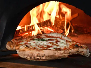 Día de la pizza: el truco de los chefs italianos para clavar la masa