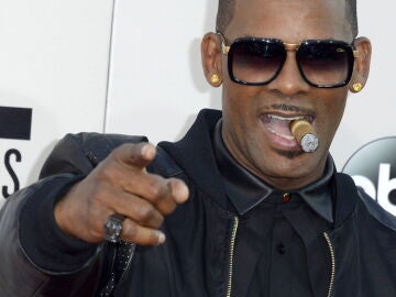 Singer R. Kelly is sentenced to 20 years in prison for child abuse