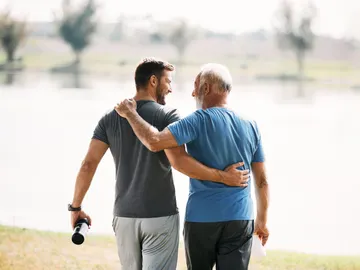 Imagen de archivo de un padre y un hijo juntos Imagen de archivo de un padre y un hijo juntos