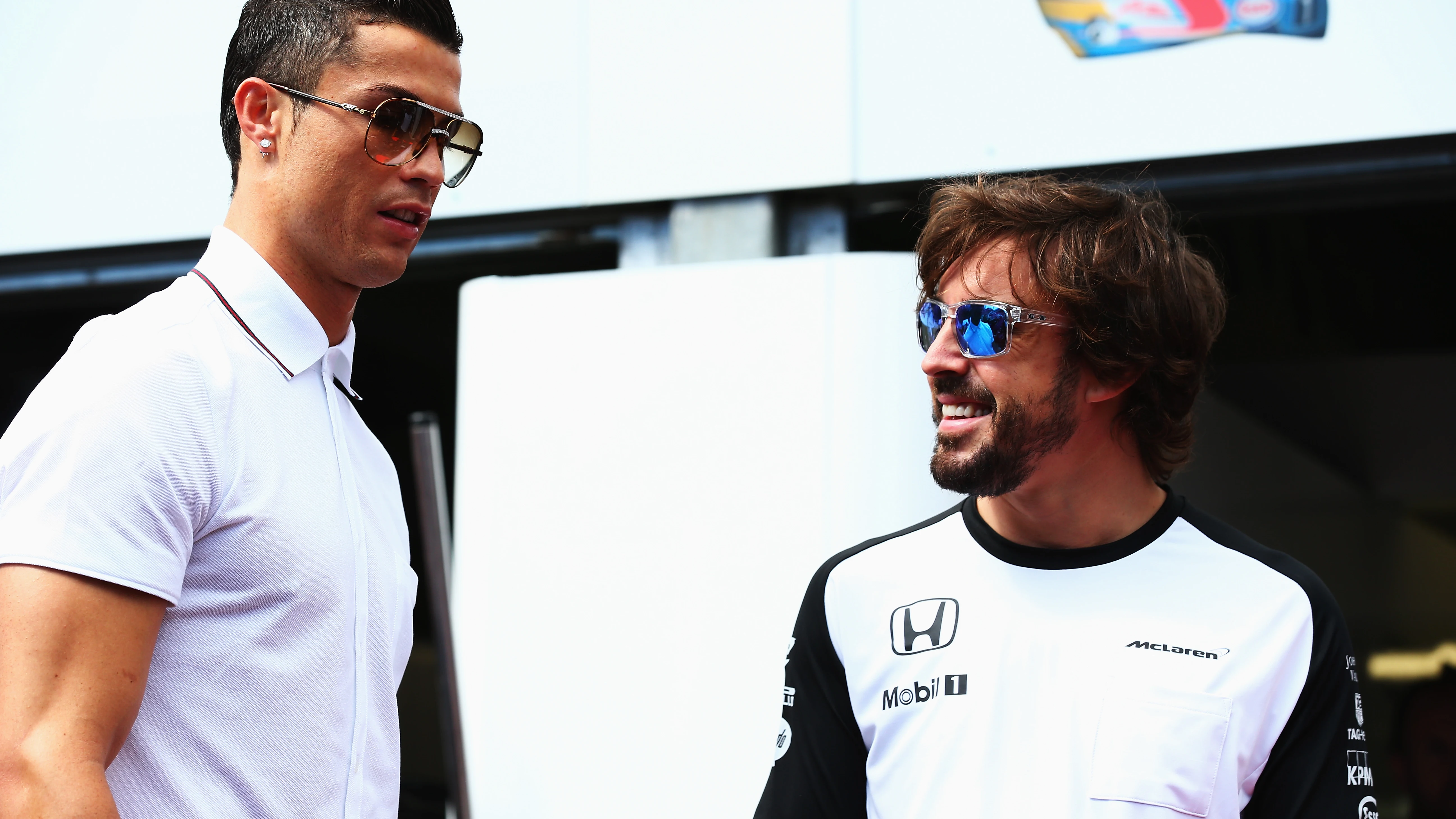 Cristiano Ronaldo y Fernando Alonso en un GP de F1