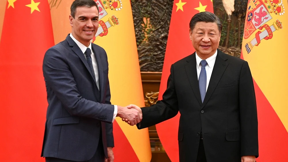 Pedro Sánchez junto a Xi Jinping