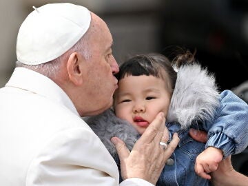 Pope Francis spends his second night hospitalized and recovers from the bronchitis he suffers from