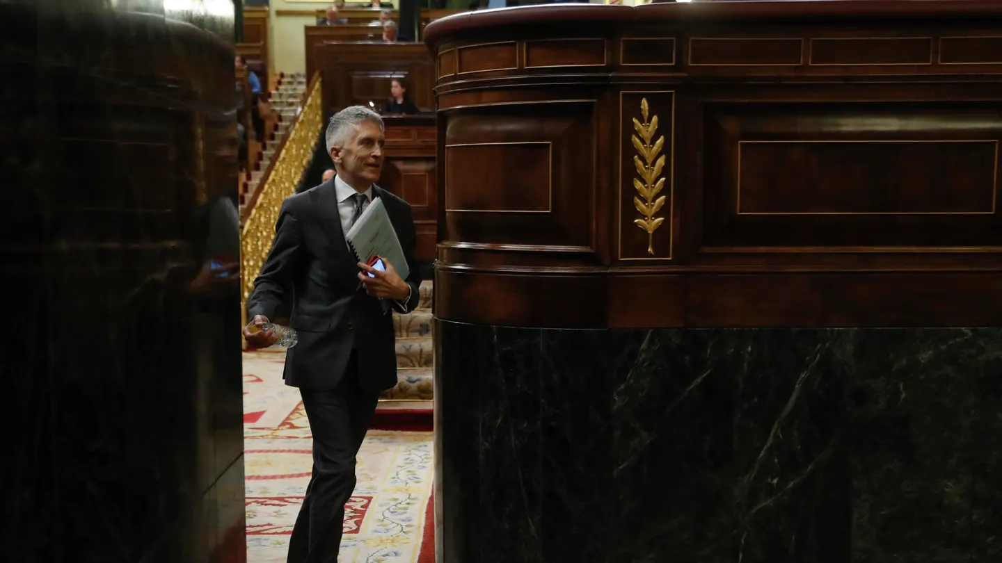 El ministro del Interior, Fernando Grande-Marlaska, durante la sesión de control al Gobierno este miércoles en el Congreso. El ministro del Interior, Fernando Grande-Marlaska, durante la sesión de control al Gobierno este miércoles en el Congreso.