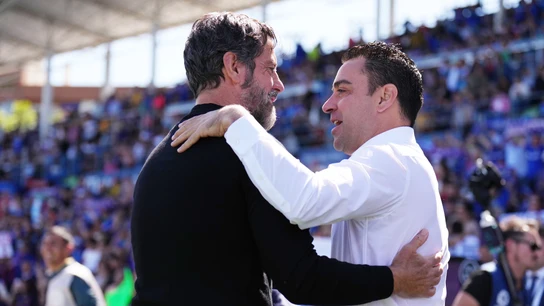 Xavi Hernández y Quique Sánchez Flores, antes del Getafe - Barça. Xavi Hernández y Quique Sánchez Flores, antes del Getafe - Barça.