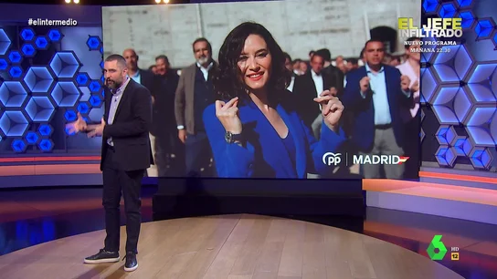 La reacción de Dani Mateo al anuncio de la campaña de Ayuso En este vídeo, Dani Mateo analiza el vídeo de presentación de la campaña de Ayuso para las elecciones autonómicas, donde hay canciones, baile, miembros del PP formando la silueta de la Comunidad de Madrid y su lema: 'Ganas'.