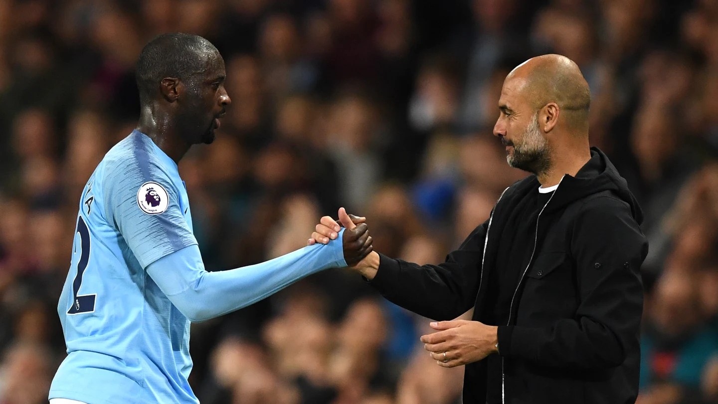 Touré Yaya y Pep Guardiola Touré Yaya y Pep Guardiola