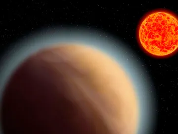 Representación artística de un exoplaneta con espesa atmósfera orbitando alrededor de una enana roja Representación artística de un exoplaneta con espesa atmósfera orbitando alrededor de una enana roja