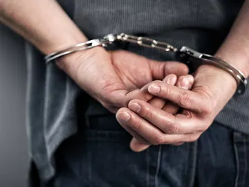 Manos esposadas Manos esposadas