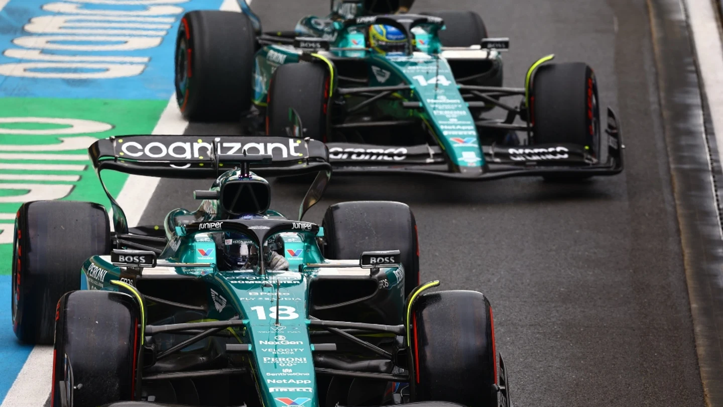 Lance Stroll y Fernando Alonso Lance Stroll y Fernando Alonso