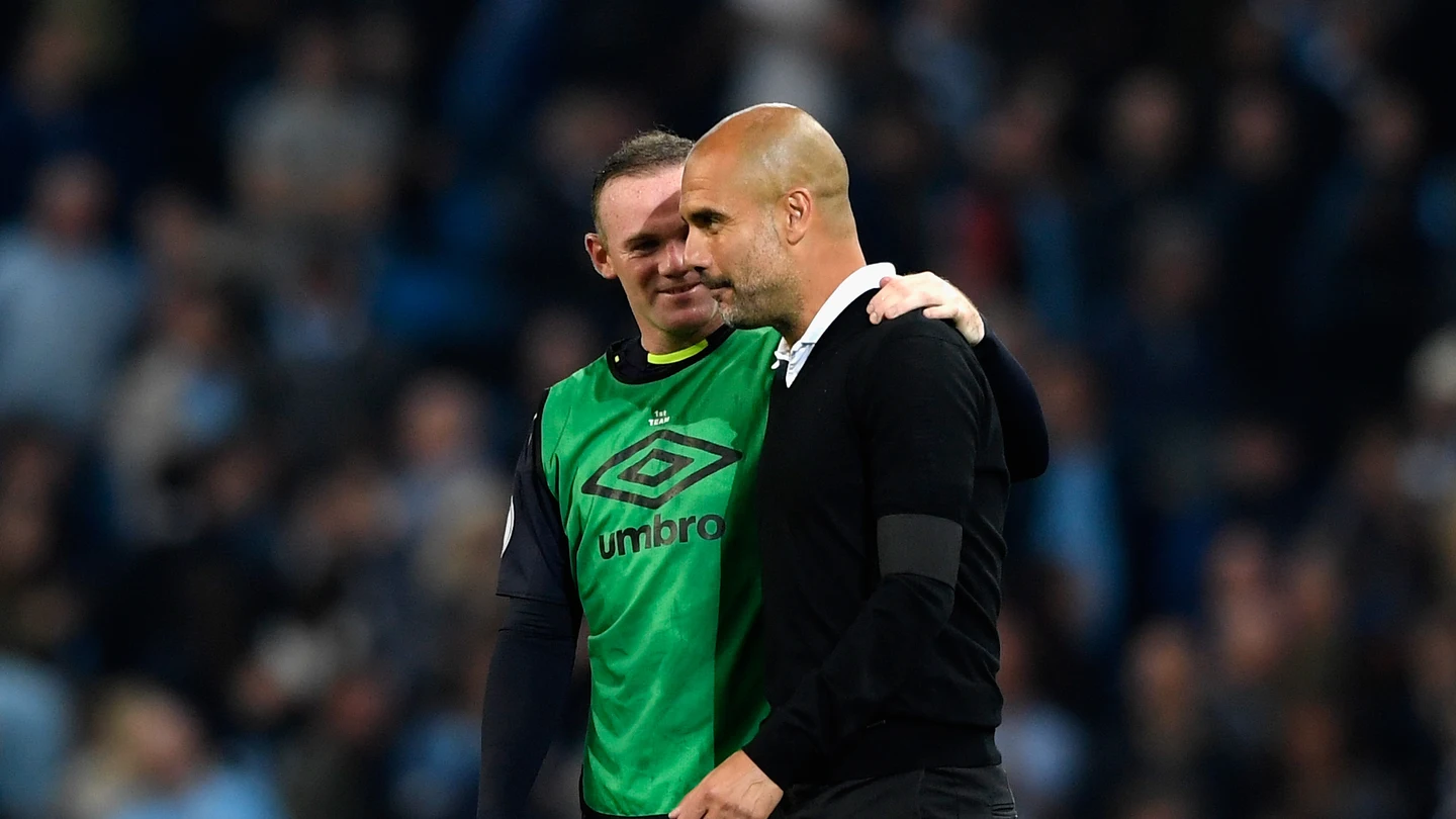 Wayne Rooney y Pep Guardiola Wayne Rooney y Pep Guardiola