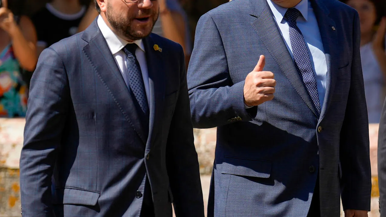 El expresident Carles Puigdemont y el actual president de la Generalitat, Pere Aragonés 