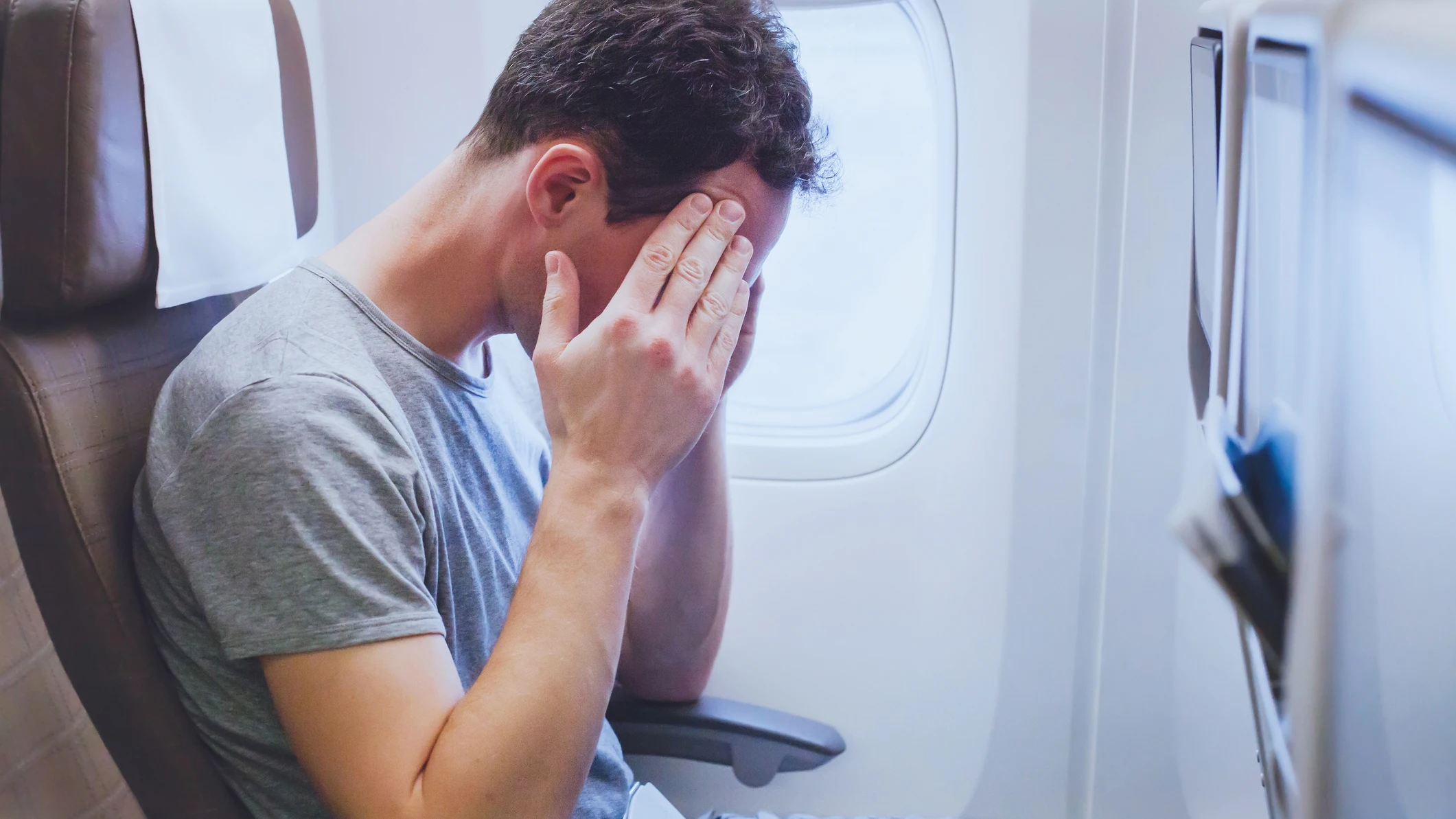 Pasajero dentro de un avi&oacute;n