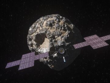 Ilustración de la nave espacial Psyche de la NASA acercándose al asteroide del mismo nombre