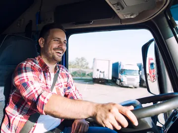 Un camionero al volante Un camionero al volante