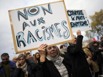 More than 100,000 people march through the streets of Paris against anti-Semitism