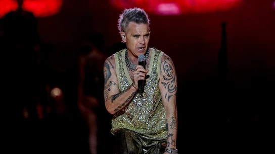 Imagen de archivo. El cantante Robbie Williams durante una actuación en la primera jornada del festival Mad Cool 2023. Imagen de archivo. El cantante Robbie Williams durante una actuación en la primera jornada del festival Mad Cool 2023.