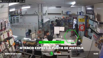 Atraco exprés a punta de pistola en una tienda de teléfonos móvil en Madrid: "¡Dónde hay más dinero, quiero más dinero!"