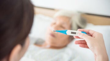 Termómetro con fiebre alta Termómetro con fiebre alta