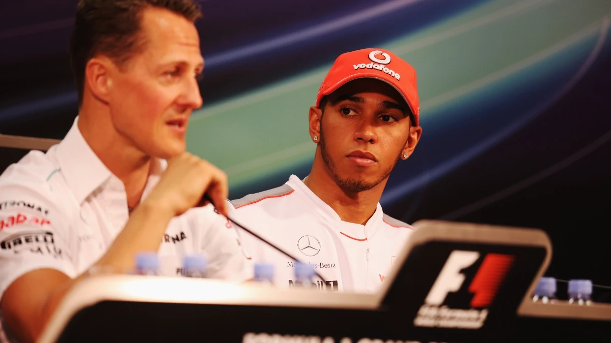 Michael Schumacher, con Lewis Hamilton