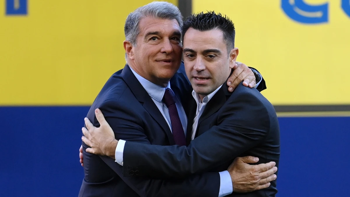 Joan Laporta y Xavi Hernández