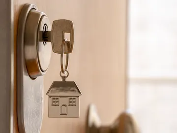 Llaves del hogar en una cerradura Llaves del hogar en una cerradura