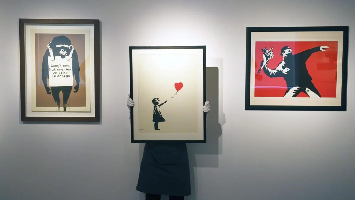 Imagen de archivo de la obra 'Girl with Balloon' de Banksy durante una subasta en Christie´s en Londres