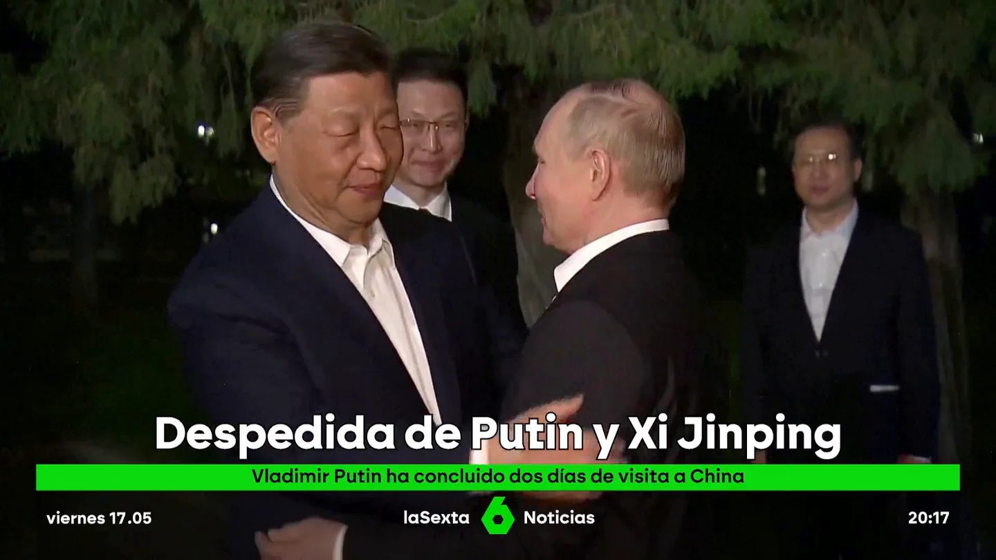 Abrazo de Putin y Xi Yinping Abrazo de Putin y Xi Yinping