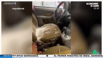 Una joven rompe su coche después de lavarlo por dentro y por fuera con una manguera