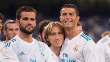 Nacho, Modric y Cristiano Ronaldo