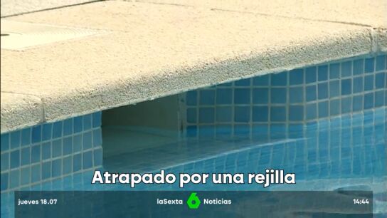 ni&ntilde;o rejilla piscina