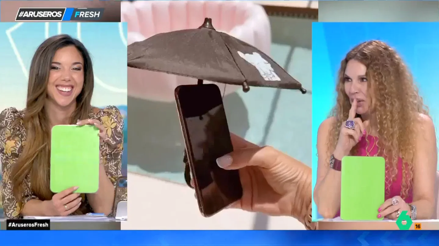 Este es el complemento perfecto para el móvil en verano: una sombrilla para poder ver la pantalla y evitar que se caliente Este es el complemento perfecto para el móvil en verano: una sombrilla para poder ver la pantalla y evitar que se caliente