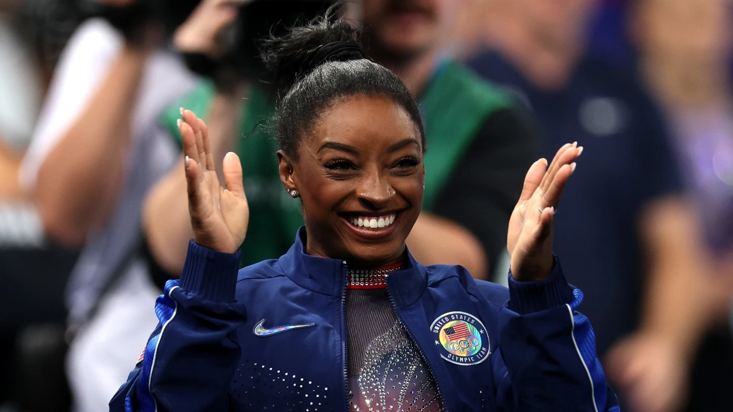 Simone Biles, aplaudiendo Simone Biles, aplaudiendo