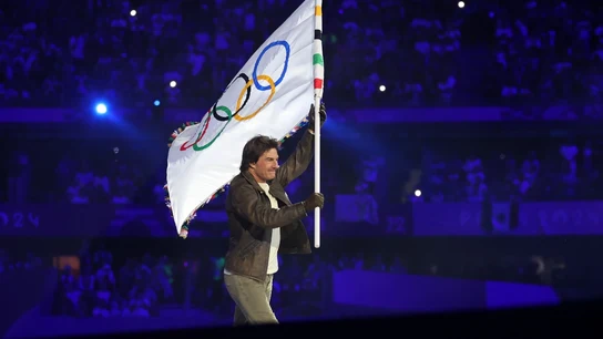 Tom Cruise, con la bandera olímpica Tom Cruise, con la bandera olímpica