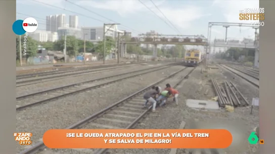 Tensión en la India: un joven se queda atrapado en las vías cuando se aproxima un tren Tensión en la India: un joven se queda atrapado en las vías cuando se aproxima un tren