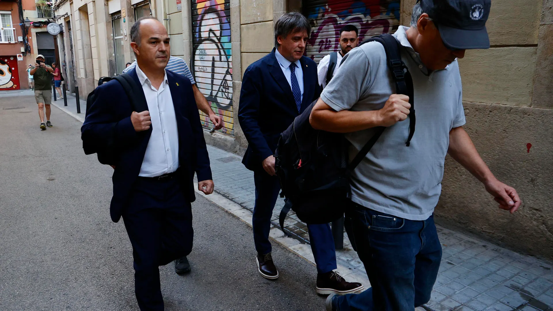 Carles Puigdemont, junto a Jordi Turull el día que regresó a Barcelona.