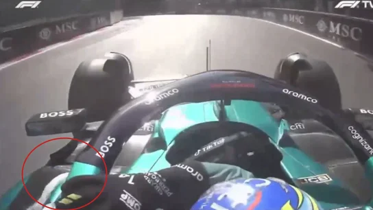 Fernando Alonso, con una bolsa en su coche Fernando Alonso, con una bolsa en su coche