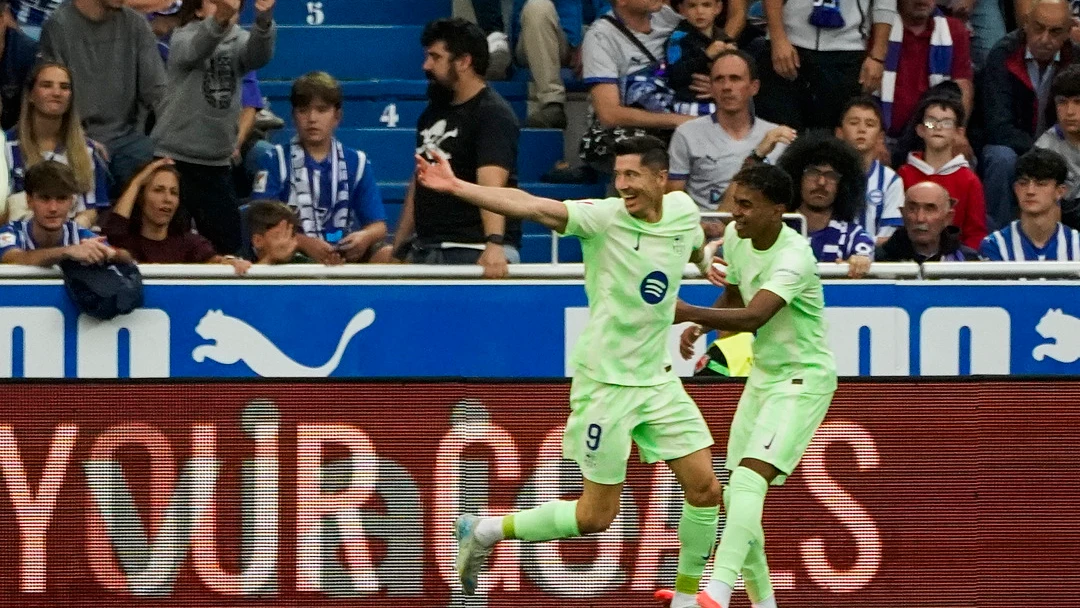 Robert Lewandowski y Lamine Yamal