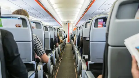 Pasajeros en un avión Pasajeros en un avión